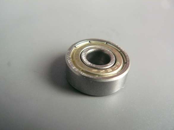 606ZZ 6mm (inside) roller bearing.